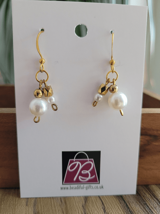 Drop earrings with white and gold theme